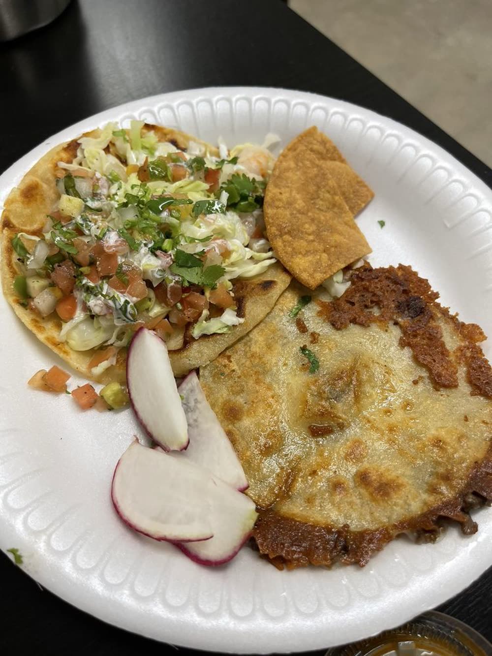 Quesadilla and tacos plate from Eagles Tacos